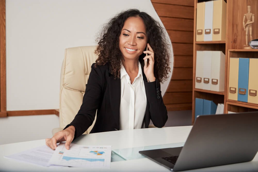 young woman in her office